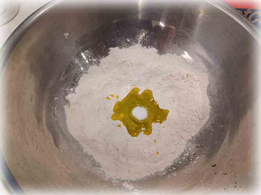Add oil to flour for the dough